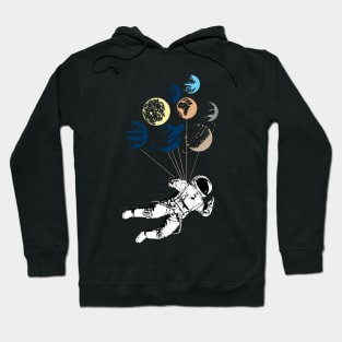 flying astronaut on ballons planets Hoodie
